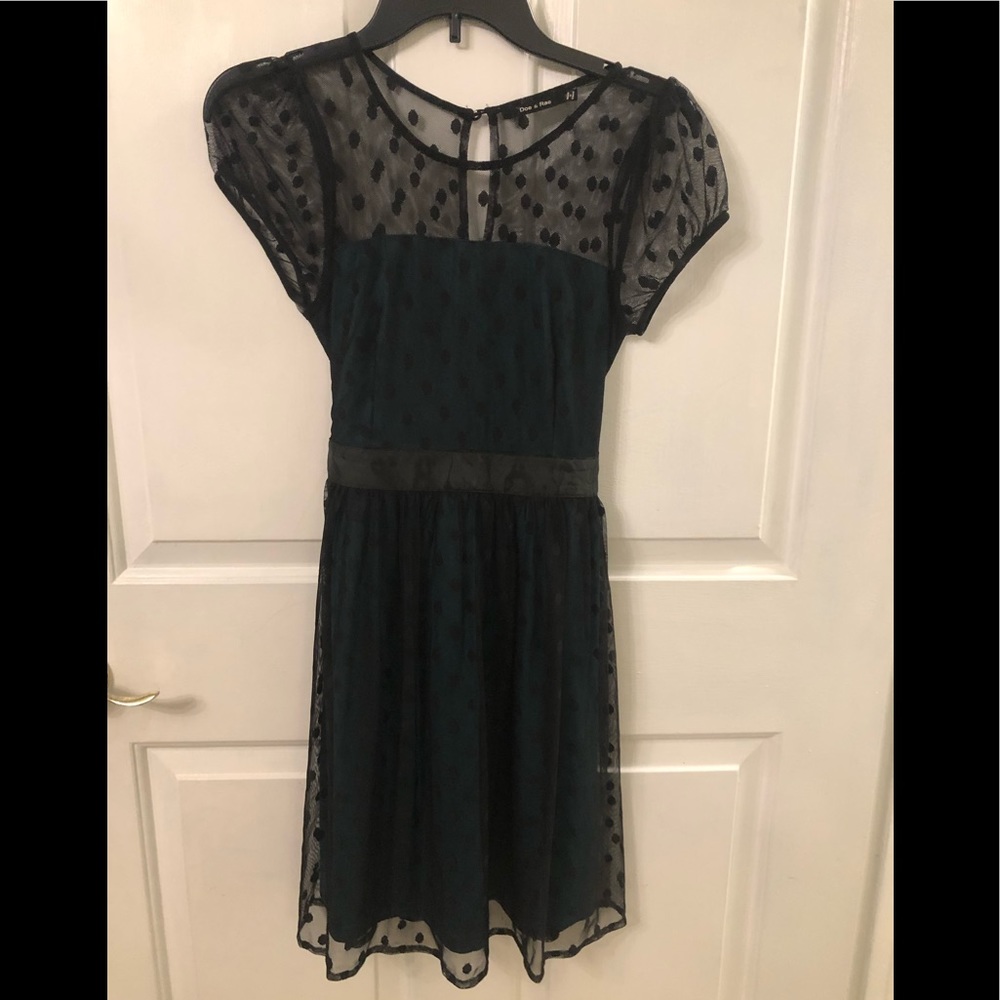 Green dress with polka dot lace top